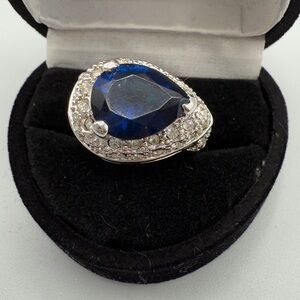 Beautiful Pear-Shaped Blue Glass Halo Ring with CZ Encrusted Base - Statement